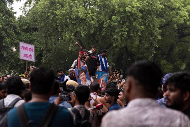 July 20, 2026, New Delhi, Delhi, India: Supporters of India s Cockroach Janta Party (CJP) gather before a march to Parliament during a protest demanding the resignation of Education Minister Dharmendra Pradhan over alleged exam paper leaks. Members of the Rapid Action Force (RAF) are deployed at the protest site near Jantar Mantar in New Delhi, India. New Delhi India  - ZUMAt180 20260720_zip_t180_003 Copyright: xJaixThakurx