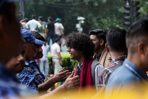 July 20, 2026, New Delhi, Delhi, India: Supporters of India s Cockroach Janta Party (CJP) gather before a march to Parliament during a protest demanding the resignation of Education Minister Dharmendra Pradhan over alleged exam paper leaks. Members of the Rapid Action Force (RAF) are deployed at the protest site near Jantar Mantar in New Delhi, India. New Delhi India  - ZUMAt180 20260720_zip_t180_015 Copyright: xJaixThakurx