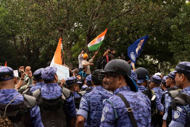 July 20, 2026, New Delhi, Delhi, India: Supporters of India s Cockroach Janta Party (CJP) gather before a march to Parliament during a protest demanding the resignation of Education Minister Dharmendra Pradhan over alleged exam paper leaks. Members of the Rapid Action Force (RAF) are deployed at the protest site near Jantar Mantar in New Delhi, India. New Delhi India  - ZUMAt180 20260720_zip_t180_017 Copyright: xJaixThakurx