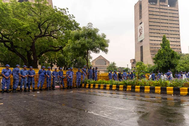 July 20, 2026, New Delhi, Delhi, India: Supporters of India s Cockroach Janta Party (CJP) gather before a march to Parliament during a protest demanding the resignation of Education Minister Dharmendra Pradhan over alleged exam paper leaks. Members of the Rapid Action Force (RAF) are deployed at the protest site near Jantar Mantar in New Delhi, India. New Delhi India - ZUMAt180 20260720_zip_t180_001 Copyright: xJaixThakurx