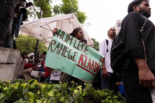 July 20, 2026, New Delhi, Delhi, India: Supporters of India s Cockroach Janta Party (CJP) gather before a march to Parliament during a protest demanding the resignation of Education Minister Dharmendra Pradhan over alleged exam paper leaks. Members of the Rapid Action Force (RAF) are deployed at the protest site near Jantar Mantar in New Delhi, India. New Delhi India - ZUMAt180 20260720_zip_t180_011 Copyright: xJaixThakurx