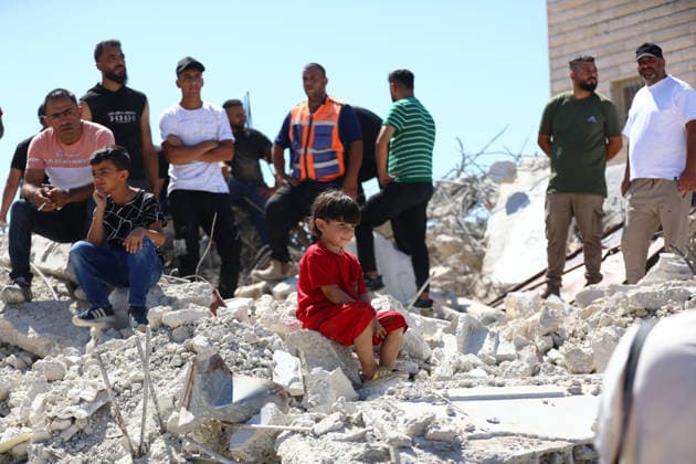 Israeli forces demolish Palestinian home in West Bank HEBRON, PALESTINE- JULY 20: Palestinian children sit on the rubble after Israeli forces demolished the home of Palestinian Ahmed Masalmeh in Beit Awwa, Hebron, West Bank, on July 20, 2026. The house was demolished on the grounds that it had been been built without a permit. Palestinians gathered on the debris following the demolition. Wisam Hashlamoun Anadolu Hebron West Bank. Editorial use only. Please get in touch for any other usage.  Copyright: x2026xAnadoluxWisamxHashlamounx