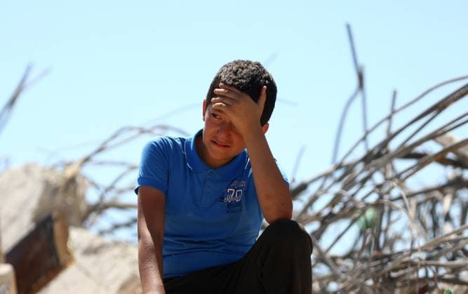 Israeli forces demolish Palestinian home in West Bank HEBRON, PALESTINE - JULY 20: Grieving Palestinian child reacts on the rubble after Israeli forces demolished the home of Palestinian Ahmed Masalmeh in Beit Awwa, Hebron, West Bank, on July 20, 2026. The house was demolished on the grounds that it had been built without a permit. Palestinians gathered at the demolished home in the aftermath of the operation. Wisam Hashlamoun Anadolu Hebron West Bank. Editorial use only. Please get in touch for any other usage.  Copyright: x2026xAnadoluxWisamxHashlamounx