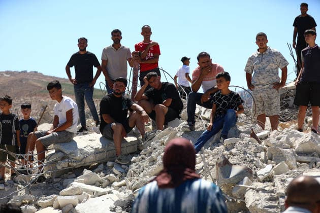 Israeli forces demolish Palestinian home in West Bank HEBRON, PALESTINE - JULY 20: Palestinians gather on the rubble of a house after Israeli forces demolished the home of Palestinian Ahmed Masalmeh in Beit Awwa, Hebron, West Bank, on July 20, 2026. The house was demolished on the grounds that it had been built without a permit. Palestinians mourned as they gathered on the debris following the demolition. Wisam Hashlamoun Anadolu Hebron West Bank. Editorial use only. Please get in touch for any other usage.  Copyright: x2026xAnadoluxWisamxHashlamounx