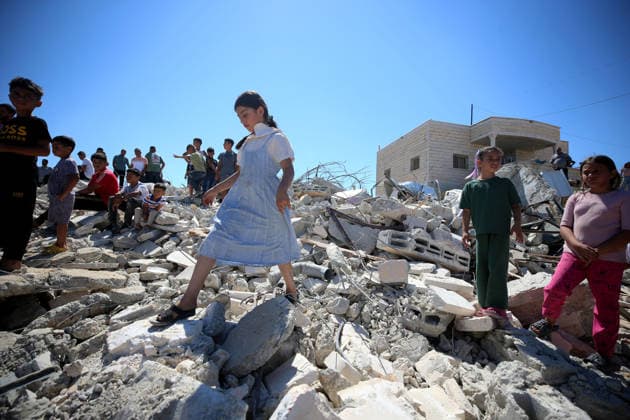 Israeli forces demolish Palestinian home in West Bank HEBRON, PALESTINE - JULY 20: Palestinians gather on the rubble of a house after Israeli forces demolished the home of Palestinian Ahmed Masalmeh in Beit Awwa, Hebron, West Bank, on July 20, 2026. The house was demolished on the grounds that it had been built without a permit. Palestinians mourned as they gathered on the debris following the demolition. Wisam Hashlamoun Anadolu Hebron West Bank. Editorial use only. Please get in touch for any other usage.  Copyright: x2026xAnadoluxWisamxHashlamounx