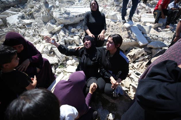 Israeli forces demolish Palestinian home in West Bank HEBRON, PALESTINE - JULY 20: Grieving Palestinians react on the rubble after Israeli forces demolished the home of Palestinian Ahmed Masalmeh in Beit Awwa, Hebron, West Bank, on July 20, 2026. The house was demolished on the grounds that it had been built without a permit. Palestinians gathered at the demolished home in the aftermath of the operation. Wisam Hashlamoun Anadolu Hebron West Bank. Editorial use only. Please get in touch for any other usage.  Copyright: x2026xAnadoluxWisamxHashlamounx
