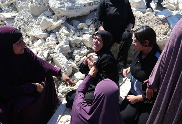 Israeli forces demolish Palestinian home in West Bank HEBRON, PALESTINE - JULY 20: Grieving Palestinian women react on the rubble after Israeli forces demolished the home of Palestinian Ahmed Masalmeh in Beit Awwa, Hebron, West Bank, on July 20, 2026. The house was demolished on the grounds that it had been built without a permit. Palestinians gathered at the demolished home in the aftermath of the operation. Wisam Hashlamoun Anadolu Hebron West Bank. Editorial use only. Please get in touch for any other usage.  Copyright: x2026xAnadoluxWisamxHashlamounx