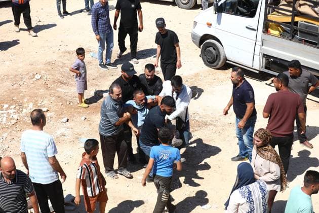 Israeli forces demolish Palestinian home in West Bank HEBRON, PALESTINE - JULY 20: A Palestinian man is assisted after fainting as Israeli forces demolished the home of Palestinian Ahmed Masalmeh in Beit Awwa, Hebron, West Bank, on July 20, 2026. The house was demolished on the grounds that it had been built without a permit. Palestinians gathered at the demolished home in the aftermath of the operation. Wisam Hashlamoun Anadolu Hebron West Bank. Editorial use only. Please get in touch for any other usage.  Copyright: x2026xAnadoluxWisamxHashlamounx