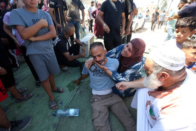 Israeli forces demolish Palestinian home in West Bank HEBRON, PALESTINE - JULY 20: A Palestinian man is assisted after fainting as Israeli forces demolished the home of Palestinian Ahmed Masalmeh in Beit Awwa, Hebron, West Bank, on July 20, 2026. The house was demolished on the grounds that it had been built without a permit. Palestinians gathered at the demolished home in the aftermath of the operation. Wisam Hashlamoun Anadolu Hebron West Bank. Editorial use only. Please get in touch for any other usage.  Copyright: x2026xAnadoluxWisamxHashlamounx
