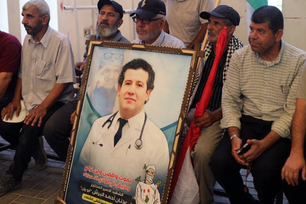 Palestinians hold solidarity rally for prisoners in Gaza City Palestinians take part in a solidarity rally outside the International Committee of the Red Cross (ICRC) headquarters in Gaza City, on July 20, 2026, in support of Palestinian prisoners held in Israeli jails. The demonstration, organized by the Prisoners Committee of the National and Islamic Forces, called for the release of prisoners and urged the international community to protect their rights and end their detention. Photo by Mohammed Salha apaimages Gaza Gaza Strip Palestinian Territory 200726_Gaza_MS_00(12) Copyright: xapaimagesxMohammedxSalhax xapaimagesx