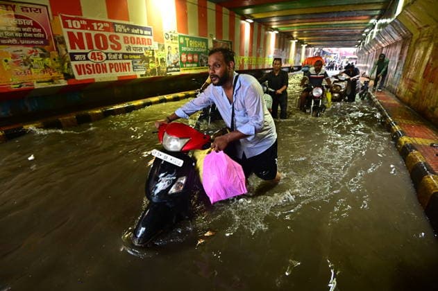 July 20, 2026, Prayagraj, Uttar Pradesh, India: Prayagraj: Vehicle ply trough a waterlogged railway under pass after heavy rain, in Prayagraj on Monday, July 20, 2026. Prayagraj India - ZUMAv115 20260720_zap_v115_026 Copyright: xPrabhatxKumarxVermax
