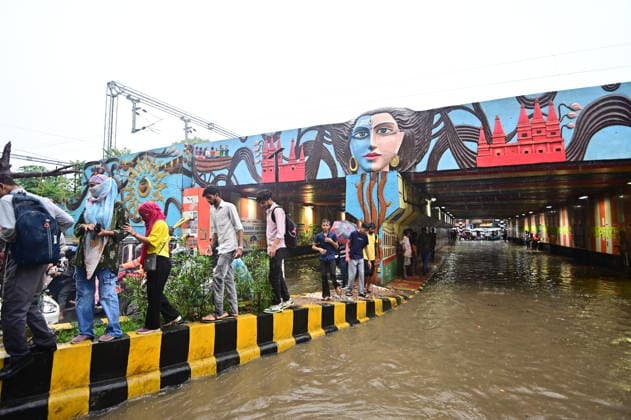 July 20, 2026, Prayagraj, Uttar Pradesh, India: Prayagraj: Vehicle ply trough a waterlogged railway under pass after heavy rain, in Prayagraj on Monday, July 20, 2026. Prayagraj India - ZUMAv115 20260720_zap_v115_027 Copyright: xPrabhatxKumarxVermax