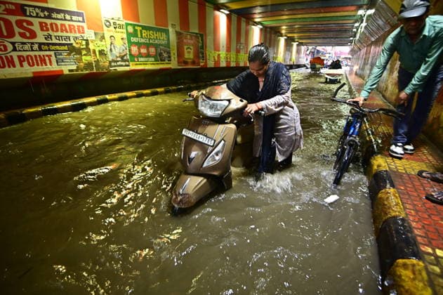 July 20, 2026, Prayagraj, Uttar Pradesh, India: Prayagraj: Vehicle ply trough a waterlogged railway under pass after heavy rain, in Prayagraj on Monday, July 20, 2026. Prayagraj India - ZUMAv115 20260720_zap_v115_029 Copyright: xPrabhatxKumarxVermax