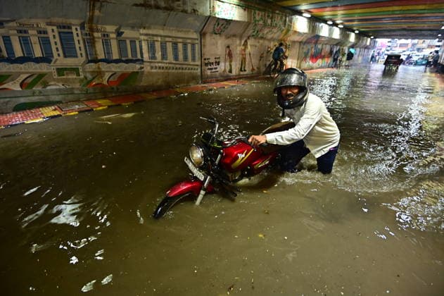 July 20, 2026, Prayagraj, Uttar Pradesh, India: Prayagraj: Vehicle ply trough a waterlogged railway under pass after heavy rain, in Prayagraj on Monday, July 20, 2026. Prayagraj India - ZUMAv115 20260720_zap_v115_033 Copyright: xPrabhatxKumarxVermax