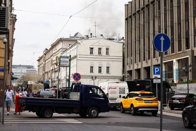 RUSSIA, MOSCOW - JULY 20, 2026: A fire spreads to an area of 20sqm on the attic floor of the Strastnoy Boulevard Building housing complex in central Moscow, 20 residents evacuating before the arrival of emergency services. Artyom Geodakyan TASS  95260002