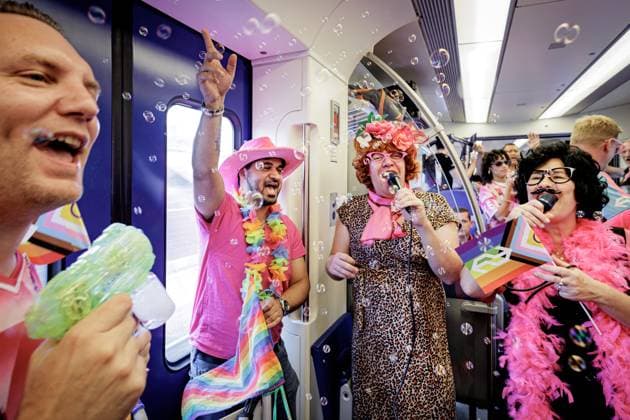UTRECHT - Participants travel to Tilburg station on the Pink Monday Express. On Pink Monday, diversity, equality, and inclusion are traditionally celebrated at the Tilburg fair. RAMON VAN FLYMEN ANP netherlands out - belgium out  Copyright: xx x563925326x originalFilename: 563925326.jpg