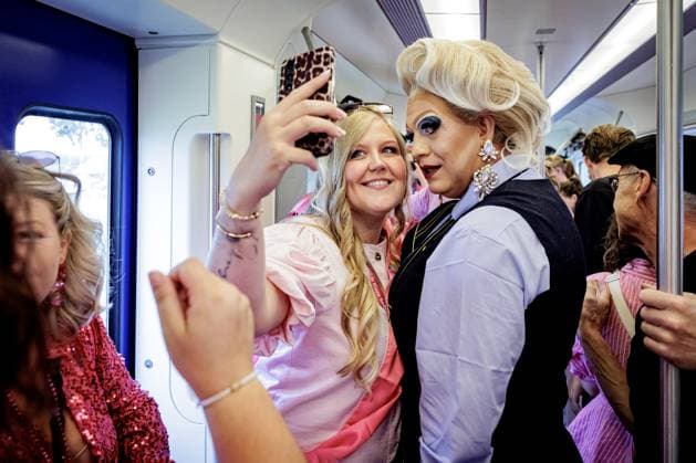UTRECHT - Participants travel to Tilburg station on the Pink Monday Express. On Pink Monday, diversity, equality, and inclusion are traditionally celebrated at the Tilburg fair. RAMON VAN FLYMEN ANP netherlands out - belgium out  Copyright: xx x563925431x originalFilename: 563925431.jpg