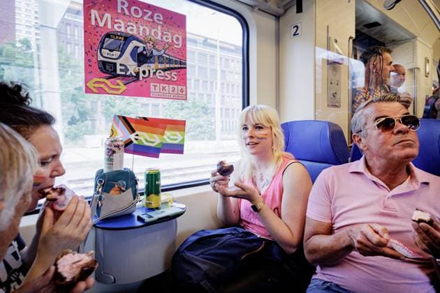 UTRECHT - Participants travel to Tilburg station on the Pink Monday Express. On Pink Monday, diversity, equality, and inclusion are traditionally celebrated at the Tilburg fair. RAMON VAN FLYMEN ANP netherlands out - belgium out  Copyright: xx x563925548x originalFilename: 563925548.jpg