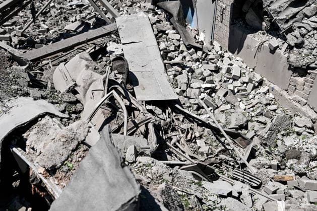 A garage cooperative is damaged by a Russian guided aerial bomb strike in the Voznesenivskyi district of Zaporizhzhia, Ukraine, July 20, 2026. The attack destroyed or damaged privately owned garages, while the blast wave and debris wrecked civilian cars. A woman was killed at the site of the strike, and five others were injured. (Photo by Dmytro Smolienko Ukrinform) Russian strike garage co-op in central Zaporizhzhia with guided bomb  Copyright: xDmytroxSmolienkox