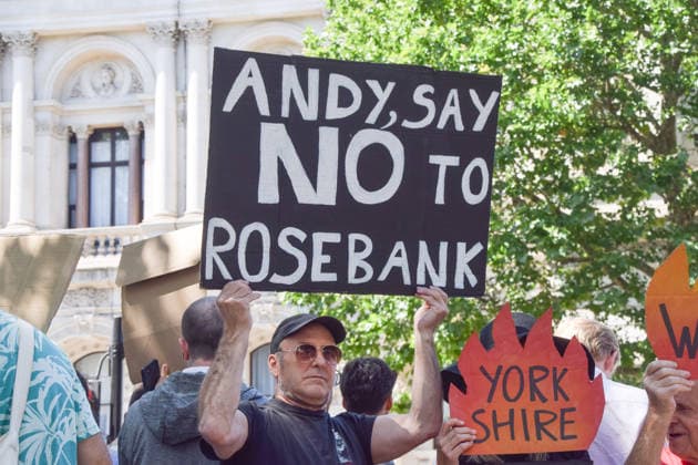 Protesters outside Downing St as Andy Burnham arrives to take over as PM, London, UK A climate activists from the group Fossil Free London holds a placard during a protest against Rosebank and other oil and gas projects in the North Sea outside Downing Street ahead of the arrival of Andy Burnham, who starts his first day as the new UK Prime Minister replacing Keir Starmer. London United Kingdom Copyright: xVukxValcicx xSOPAxImagesx VukValcicBurnhamProtestsDowning200726_57