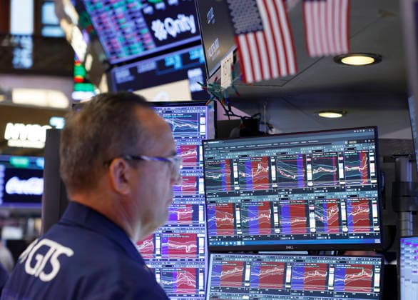 Traders work on the floor of the New York Stock Exchange on Wall Street on Monday, July 20, 2026 in New York City. The S&P 500 and Nasdaq Composite began the day higher on Monday and oil prices fluctuated in response to the latest bout of military exchanges between the U.S. and Iran.  NYP20260720107 JOHNxANGELILLO