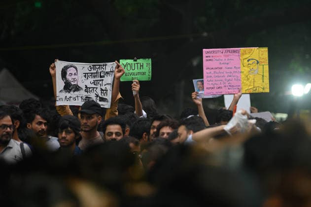 July 20, 2026, New Delhi, New Delhi, India: NEW DELHI, India Ã¢â‚¬ Protesters hold placards, including one styled as a mock degree certificate awarding Prime Minister Narendra Modi a Master of Jumlebazi and listing alleged government failures, at Jantar Mantar during demonstrations by the Cockroach Janata Party (CJP) demanding the resignation of Education Minister Dharmendra Pradhan over alleged irregularities in the NEET-UG exam, July 20, 2026. New Delhi India - ZUMAm184 20260720_zip_m184_009 Copyright: xAnkitxRoyxMajumderx
