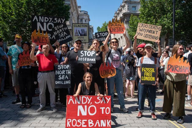 July 20, 2026, London, England, United Kingdom: Supporters of the Fossil Free London staged a demonstration outside Downing Street to demand from the new Prime Minister of the United Kingdom, Andy Burnham to say no for the Rosebank oilfield drilling on the North Sea. .The Rosebank oil field is the UKÃ¢â‚¬â ¢s largest untapped oil reserve, located roughly 130 km west of Shetland. Operated by Adura (a joint venture between Equinor and Shell) and co-owned by Ithaca Energy. London United Kingdom - ZUMAe120 20260720_zip_e120_016 Copyright: xKrisztianxElekx