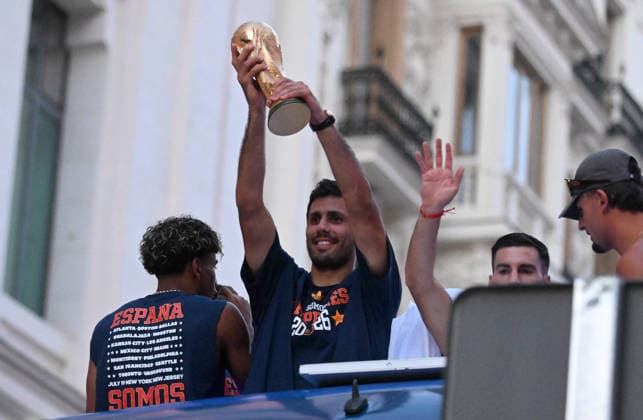 The Spanish National Team celebrates its World Cup victory with a parade in Madrid. Team captain Rodri Hernández holds the World Cup trophy during the Spanish National Team’s victory parade for winning the 2026 World Cup, on July 20, 2026, in Madrid, Spain. The Spanish team became the 2026 World Cup champions yesterday after defeating Argentina 1–0 with a goal by Ferrán Torres. SOCCER CELEBRATION WORLD CUP VICTORY José Madrid Madrid Spain  Copyright: xJosÃ xOlivax 7678177