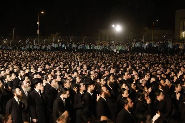 July 20, 2026, Cfar Yona, Israel: CFAR YONA, ISRAEL Ã¢â‚¬ JULY 20, 2026: Ultra-Orthodox Jewish demonstrators, including members of the Gur Hasidic community, gather outside Military Prison 10 to protest the arrest of a Haredi man accused of evading compulsory military service. Organisers estimated that more than 20,000 people took part in the demonstration, which escalated into clashes and created hazardous conditions for journalists covering the event. JNA Press Cfar Yona Israel  - ZUMAq101 20260720_zna_q101_256 Copyright: xHilelxBenxOrx