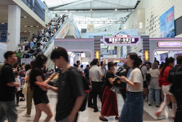 SHANGHAI, CHINA - JULY 20: Visitors walk through the Shanghai World Expo Exhibition and Convention Center during the 2026 World Artificial Intelligence Conference on July 20, 2026 in Shanghai, China. The 2026 World AI Conference and High-Level Meeting on Global AI Governance scheduled from July 17 to July 20 showcases exhibitions of smart devices, AI plus culture and entertainment experiences, and a wide range of cutting-edge AI products, among which a range of humanoid robots and AI-powered dexterous hands as one of the highlights.  Copyright: xChinaxNewsxServicex 111655402412