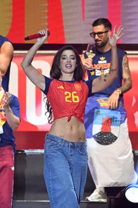 The Spanish National Soccer Team Celebrates the World Cup with a Huge Party at Cibeles Ana Mena and Lola Índigo during the World Cup celebration at Cibeles on July 20, 2026, in Madrid, Spain. The Spanish national soccer team celebrated its second World Cup title in Madrid in front of two million fans, who braved the heat to celebrate the latest success of Luis de la Fuente’s team at a closing celebration in Plaza de Cibeles that put the finishing touch on 24 unforgettable hours. JULY 21, 2026, Madrid, Spain  Copyright: xOscarxOrtizx 7678488