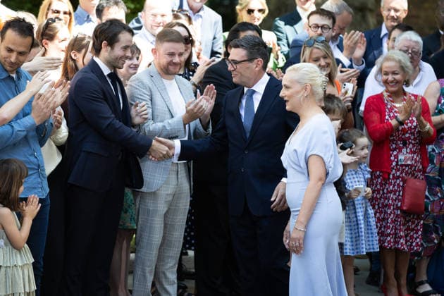 July 20, 2026, London, United Kingdom: Prime Minister Andy Burnham and his wife Marie France Van Heel greet supporters before entering 10 Downing Street, London. As the new Labour leader and leader of the party in government, Burnham was invited by King Charles III to form an administration in his name after Keir Starmer tendered his resignation earlier today. London United Kingdom - ZUMAs197 20260720_aaa_s197_359 Copyright: xTejasxSandhux