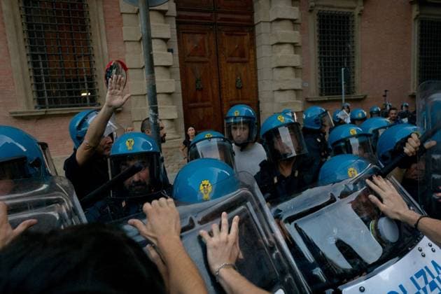 Thousands protest in Bologna over death of Abderrahim Fakir BOLOGNA, ITALY JULY 20, 2026: Thousands of people march through central Bologna to protest the death of Abderrahim Fakir, a 42-year-old Italian-Moroccan man who died during a police stop. The demonstration begins in Piazza del Nettuno following a press conference by municipal authorities and proceeds toward the Prefecture, with protesters demanding accountability and condemning alleged police brutality and racial profiling. Clashes later erupt between demonstrators and riot police, who use tear gas and water cannons as tensions spread to Via Rizzoli. Bologna Italy Copyright: x xThomasxCavagnax xJNAxPressx