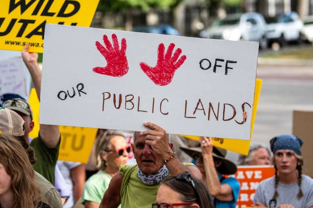July 20, 2026, Salt Lake City, Utah, USA: Demonstrators hold signs during a protest outside the Utah Governor s Mansion in Salt Lake City, Utah, on Monday, July 20, 2026. The community rally was organized to protest executive actions drastically reducing the boundaries of the Bears Ears and Grand Staircase-Escalante national monuments. Salt Lake City USA  - ZUMAm292 20260720_znp_m292_060 Copyright: xCharlesxMcClintockxWilsonx