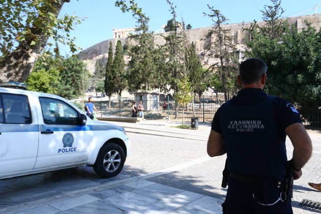July 21, 2026, Athens, Greece: Police officers secure the area near the entrance to the Acropolis archaeological site in Athens, Greece, after a man allegedly stabbed two American tourists. The two injured visitors received medical treatment, while the suspect was detained by authorities. An investigation into the incident is ongoing. Athens Greece  - ZUMAv62_ 20260721_zaf_v62_005 Copyright: xAristidisxVafeiadakisx