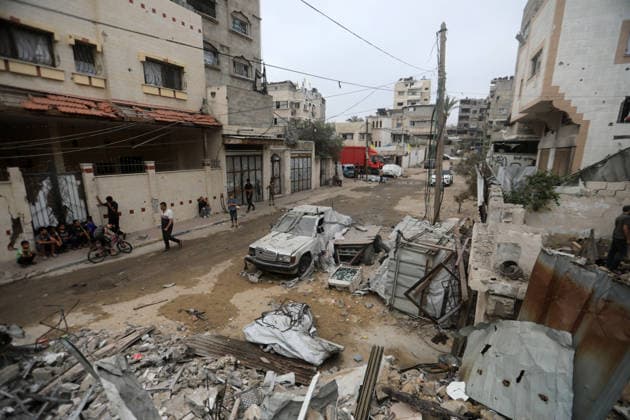 Palestinians inspect site of deadly strike on family home in Gaza City Palestinians inspect the site of an Israeli airstrike that targeted a house belonging to the al-Masri family on al-Thalathini Street in Gaza City, on July 21, 2026. Medical sources said the strike killed Firas al-Masri, his wife, and their four children. Photo by Bilal Osama apaimages Gaza city Gaza Strip Palestinian Territory 210726_Gaza_BO_00(27) Copyright: xapaimagesxBilalxOsamax xapaimagesx