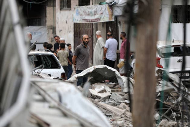 Palestinians inspect site of deadly strike on family home in Gaza City Palestinians inspect the site of an Israeli airstrike that targeted a house belonging to the al-Masri family on al-Thalathini Street in Gaza City, on July 21, 2026. Medical sources said the strike killed Firas al-Masri, his wife, and their four children. Photo by Bilal Osama apaimages Gaza city Gaza Strip Palestinian Territory 210726_Gaza_BO_00(37) Copyright: xapaimagesxBilalxOsamax xapaimagesx