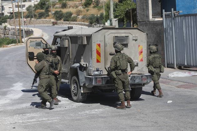 Israeli forces demolish Palestinian home east of Hebron Israeli bulldozers demolish a two-story house belonging to Fouad Jaradat in the Wadi al-Sharakh area of Sa ir, east of Hebron in the occupied West Bank, as Israeli forces deploy in the area and Palestinians inspect the site, on July 21, 2026. Israeli authorities said the house was built without a permit. Photo by Mamoun Wazwaz Hebron West Bank Palestinian Territory 210726_Hebron_MW_00(11) Copyright: xapaimagesxMamounxWazwazx xapaimagesx