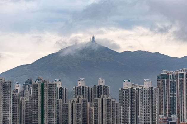 July 21, 2026, Hong Kong, Hong Kong, China: Tai Mo Shan, Hong Kong s highest peak, photographed from Tsing Yi on July 21, 2026. Standing at an elevation of 957 metres, Tai Mo Shan is also an extinct volcano and a popular hiking spot. Hong Kong China  - ZUMAm298 20260721_zip_m298_001 Copyright: xJamesxModestox