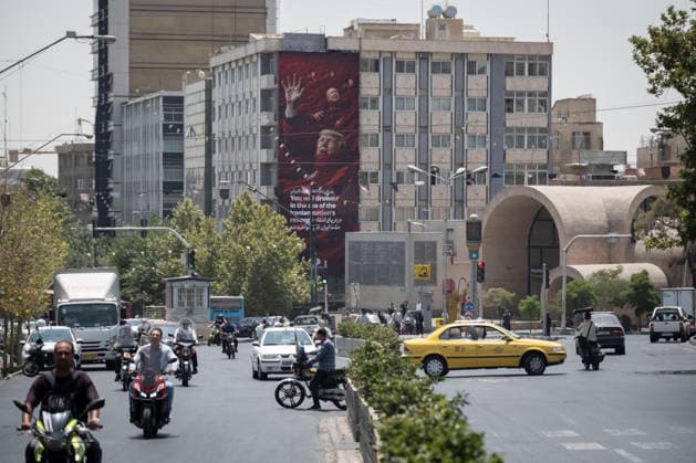 Anti‘Trump Messaging Appears On Billboards In Tehran Vehicles and motorcycles move beneath an anti-U.S.-Israeli billboard in downtown Tehran, Iran, on July 21, 2026, amid renewed conflicts between Iran and the United States in southern Iran. MORTEZA NIKOUBAZL NurPhoto Tehran Tehran Iran  Copyright: xMortezaxNikoubazlx originalFilename: nikoubazl-antitrum260721_npeCu.jpg