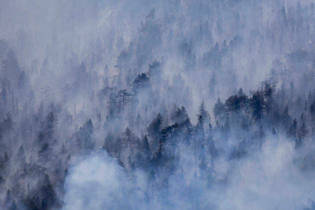 Argentiere La Bessee Wildfire - France Smoke rises from a burned forest after a major wildfire near L Argentiere la Bessee, the charred mountainside continues to smolder as firefighters monitor remaining hotspots following intense fire activity. Hautes Alpes, France, July 21, 2026. Photo by Thibaut Durand ABACAPRESS.COM Argentiere La Besse Provence-Alpes-Cote d Azur France  Copyright: xDurandxThibaut ABACAx