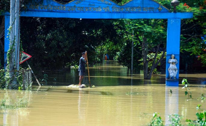 Man Uses Makeshift Raft to Navigate Floodwaters in Assam™s Jorhat Jorhat Assam , Jul 21 (ANI): A man uses a makeshift raft to navigate floodwaters along an inundated road in Teok as widespread flooding disrupts normal life, in Jorhat on Tuesday. Jorhat Assam India Copyright: xANIx ANI_20260721433