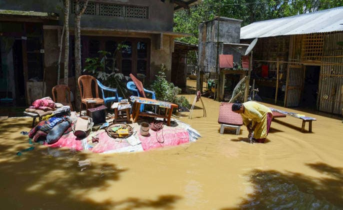 Flood-Affected Villagers Dry Belongings After Floods in Assam™s Jorhat District Jorhat Assam , Jul 21 (ANI): Flood-affected villagers dry their belongings notes in the open after their homes were inundated due to floods, in Jorhat on Tuesday. Jorhat Assam India Copyright: xANIx ANI_20260721489