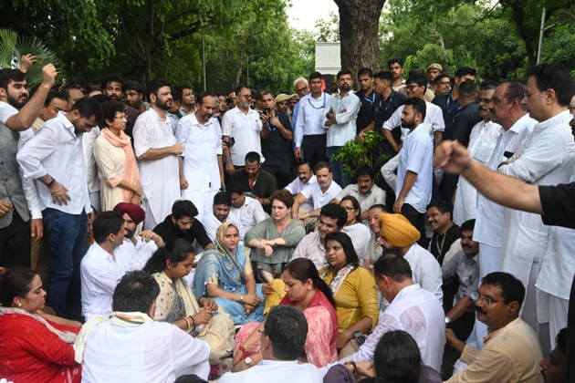NEW DELHI, INDIA - JULY 21: Leader of Opposition in the Lok Sabha Rahul Gandhi with Priyanka Gandhi Vadra, Kerala Chief Minister VD Satheesan, Congress MP KC Venugopal, and others, stages a sit-in protest near the Prime Minister s residence in solidarity with students protesting over alleged irregularities in the NEET examination, on July 21, 2026 in New Delhi, India. The spontaneous demonstration at Lok Kalyan Marg unfolded a day after security forces used tear gas and lathi charges to disperse student marchers led by the Cockroach Janata Party (CJP) near Parliament Street. Rahul Gandhi demanded the immediate resignation of Union Education Minister Dharmendra Pradhan and an urgent, dedicated debate in Parliament regarding the NEET paper l
