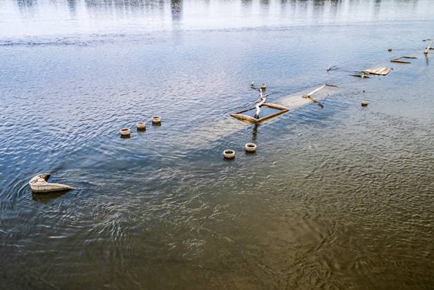 Low water reveals remains of century-old ship on Croatia s Danube An aerial view shows the remains of a ship believed to be more than a century old after record-low water levels in the Danube River exposed the wreck in Opatovac, Croatia, on July 21, 2026. The vessel is believed to have sunk between the two World Wars.  DavidxJerkovic PIXSELL