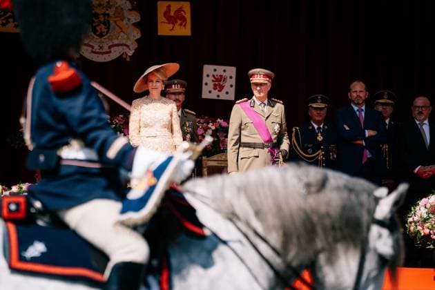 Queen Mathilde of Belgium and King Philippe - Filip of Belgium pictured during the military and civilian parade on the Belgian National Day, in Brussels, Tuesday 21 July 2026. This parade pays tribute to our Belgium s security and emergency services, such as the army, police, fire brigade or civil protection. MARIUS BURGELMAN  MariusxBurgelman 181690043
