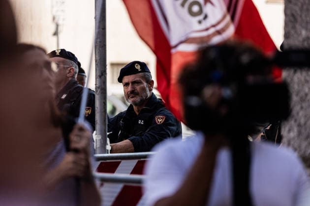 July 21, 2026, Milan, Mi, Italy: Police guard a protest was organized following the death of Abderrahim Fakir, a 42-year-old entrepreneur of Moroccan origin who died on Sunday while being pinned face-down on the ground by police officers. The demonstration in memory of Fakir, held in front of the prefecture, drew hundreds of people. Milan Italy - ZUMAc276 20260721_zip_c276_001 Copyright: xAndreaxCarrubbax