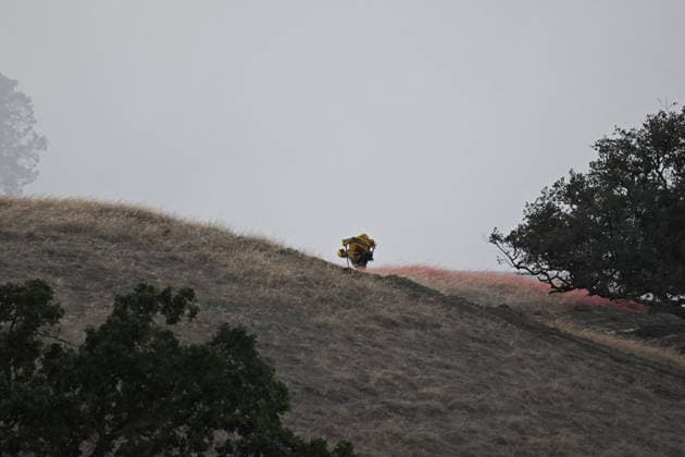 Little Fire of wildfire continues in Sunol, California SUNOL, CALIFORNIA - JULY 21: A firefighter is seen as crews battle wildfire named as Little Fire in Sunol, Alameda County, California on July 21, 2026. Tayfun Coskun Anadolu California United States. Editorial use only. Please get in touch for any other usage.  Copyright: x2026xAnadoluxTayfunxCoskunx