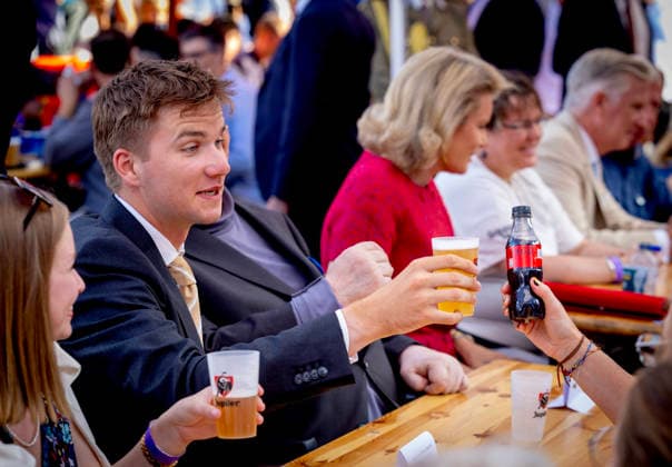21-07-2026 Resto Prince Gabriel with beer bier during the Everyone to the Table initiative by Resto National at Vossenplein - Place du Jeu de Balle, as part of the National Holiday in Brussels Â  Copyright: xPPEx