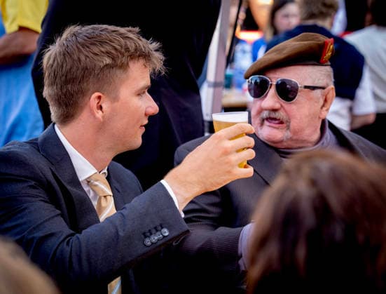 21-07-2026 Resto Prince Gabriel with beer bier during the Everyone to the Table initiative by Resto National at Vossenplein - Place du Jeu de Balle, as part of the National Holiday in Brussels Â  Copyright: xPPEx